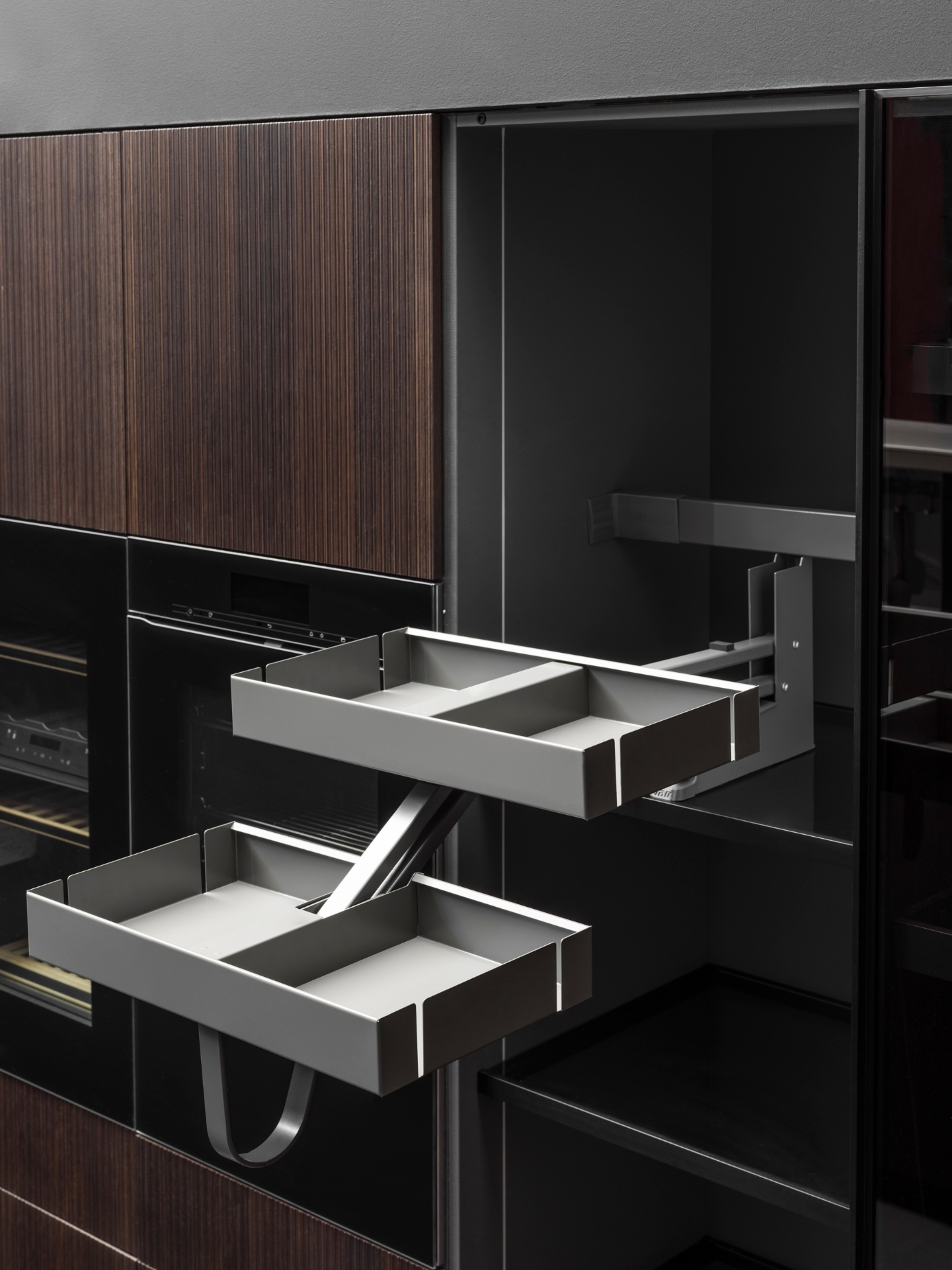 Premium pull-out drawer system in modern kitchen cabinet