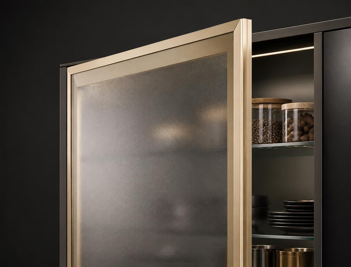 Aluminium Profile Shutters for Glass & Mirror Doors 3D render of a champagne gold mitred aluminium frame profile shutter holding a frosted glass panel on a kitchen display cabinet