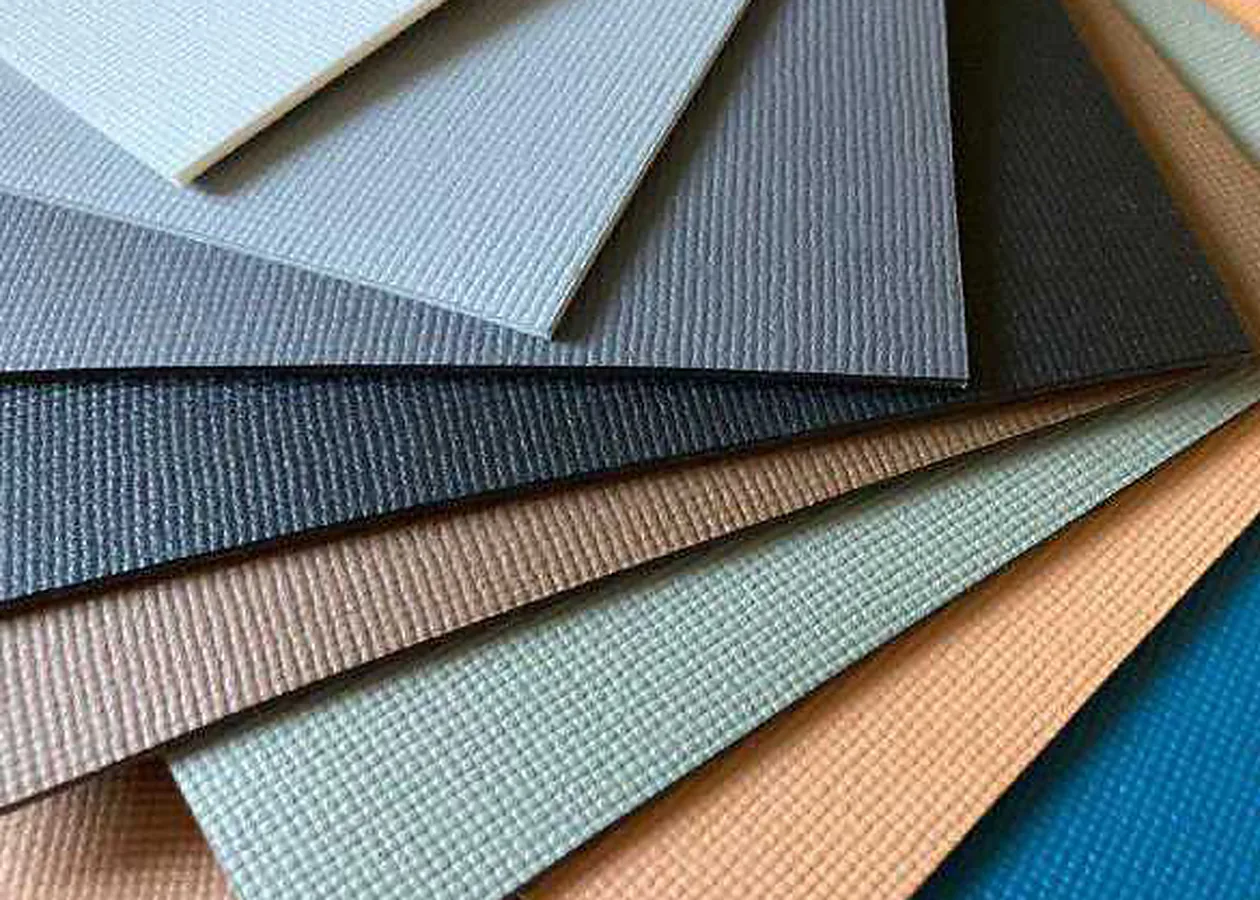 Textured drawer liner Mirano textured drawer liner swatches fanned out in blue-grey, grey, charcoal, tan, teal and blue